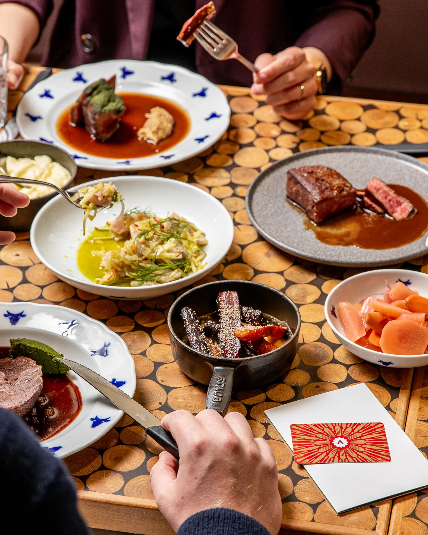 asting menu with beef steak and side dishes served at Čestr restaurant.